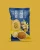 Muffinka pistacjowa 60 g — opakowanie na tle w kolorze produktu